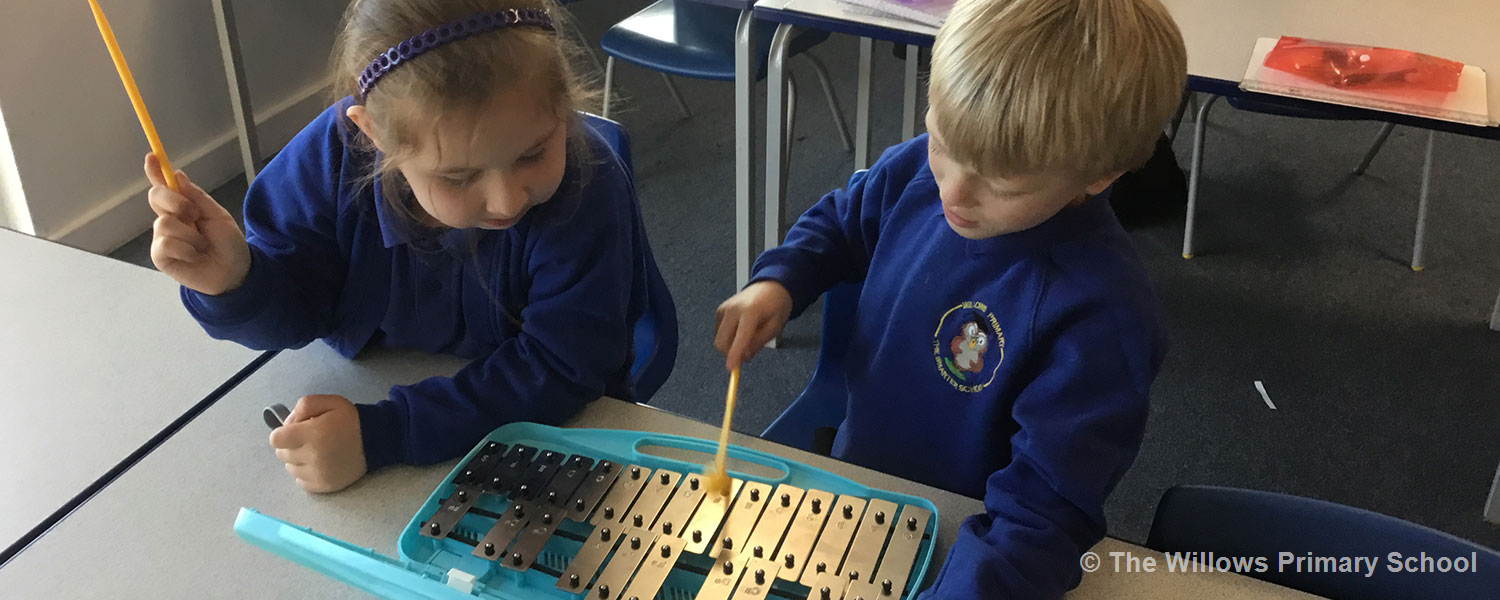 students playing on glockenspiel